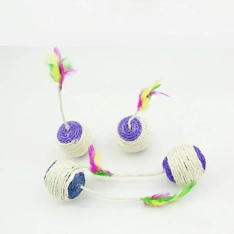 Stylish sisal scratch ball with feather designed for claw maintenance and playful engagement.
