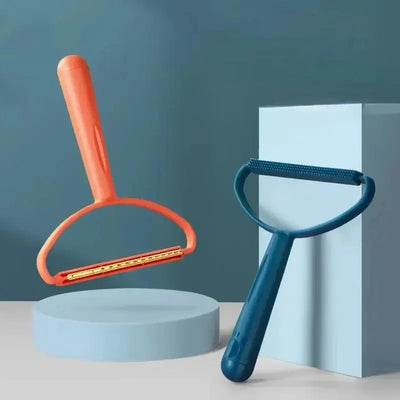 Pocket lint remover tool brushing pet hair off clothing