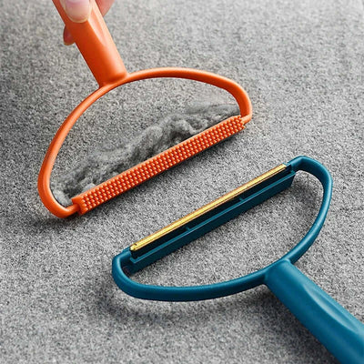 Handheld pet hair remover perfect for travel and daily touch-ups