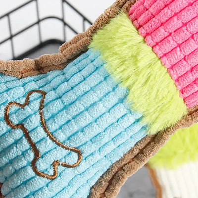Heavy-duty squeaky bone toy for dogs, perfect for teething and dental health.