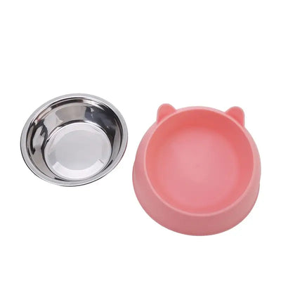 Creative inclined cat bowl set featuring a pink bowl and a stainless steel feeding dish for pets.